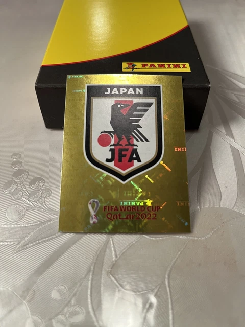Panini FIFA Fussball-Weltmeisterschaft Katar 2022 Albumaufkleber - JPN2 Japan Team Abzeichen Folie