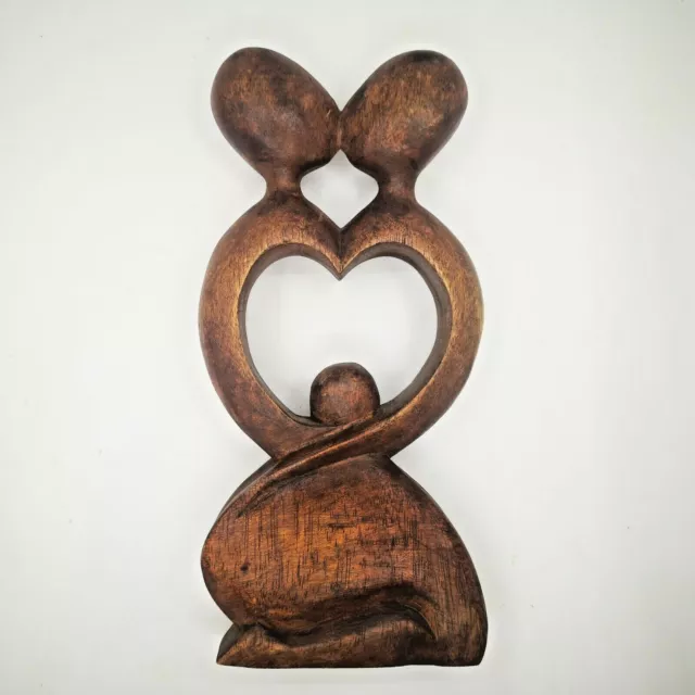 Figura de madera hecha a mano en Indonesia corazón pareja beso tallada