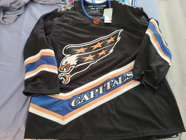 FOR SALE/TRADE! Capitals Reverse Retro 2.0. Just arrived from BenHSports  and unfortunately it fits small in the torso and hips. Willing to either  get a size 60 of the same jersey or