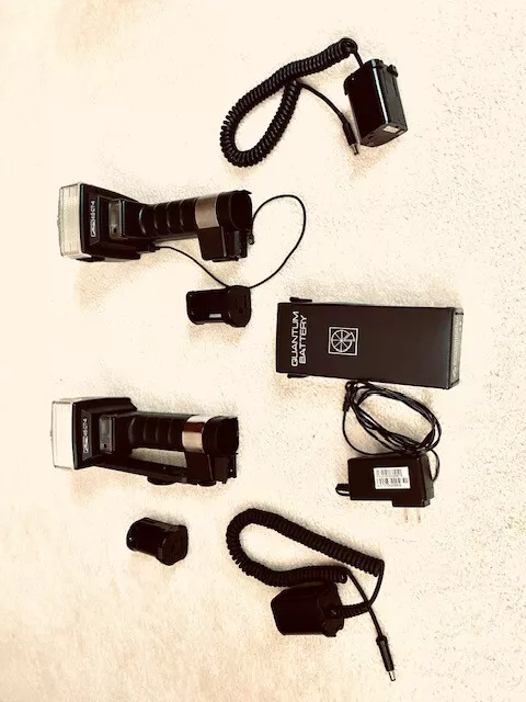 Two Metz 45 CT-4 Electronic Handle Mount Flash Holder with one Quantum Battery 2