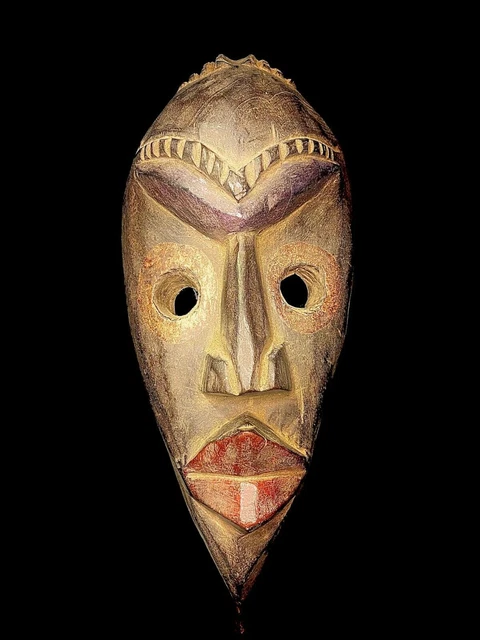 Maschera africana antica intagliata a mano in legno da parete con...