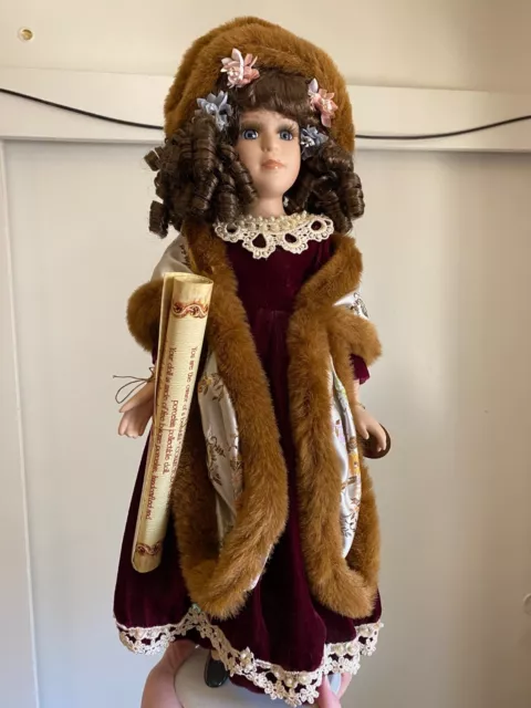 collectors choice porcelain doll brown hair, fur lined Shaw used
