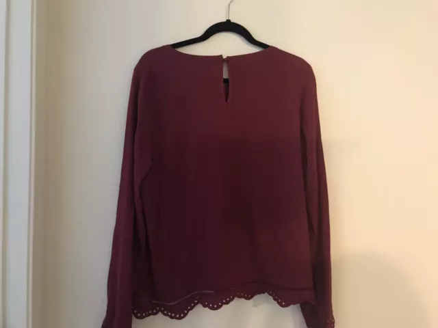 womens long sleeve tops size medium. Brand Storee