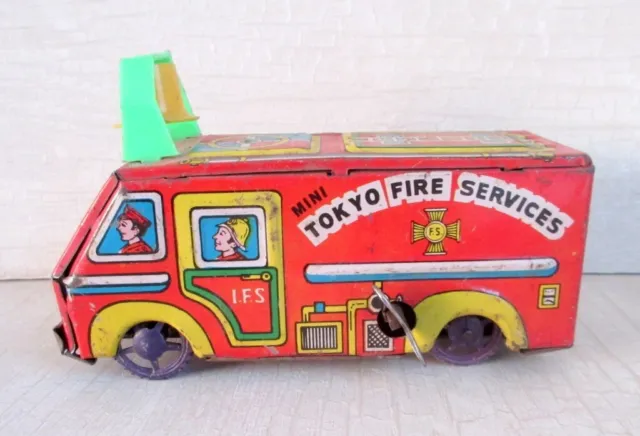 Vintage Old Rare Wind Up Mini Tokyo Fire Services Litho Tin Toy Japan?