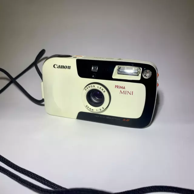 Canon Prima Mini 35mm compact camera. 32mm f/3.5 prime lens - WORKING