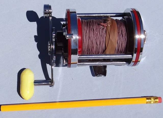 PENN SQUIDDER 140 Bait Casting Fishing Reel w/Colored Lead