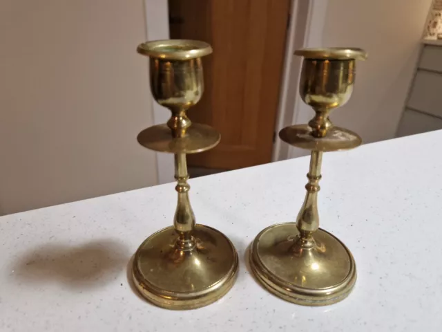 A Pair of Antique Brass Candlesticks