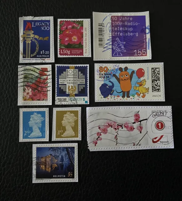 Lot de 10 timbres de Pays divers et années diverses - encore sur frag Stamps K91