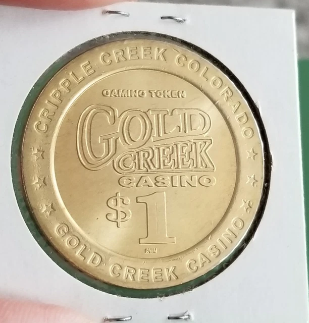 OBSOLETE! GOLD CREEK CASINO (Cripple Creek) $1 BRASS GAMING TOKEN OBSOLETE! GOLD CREEK CASINO (Cripple Creek) $1 BRASS GAMING TOKEN