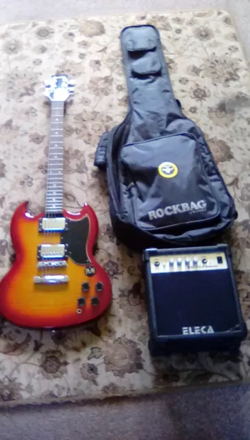 Samick SG electric guitar,practice amp and gig bag