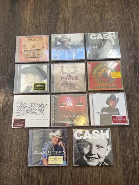 Lot of 11 SEALED Country Music CD’s: Johnny Cash Tim McGraw Alabama Jason Aldean
