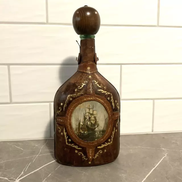 https://www.picclickimg.com/xRMAAOSwnhxjoor~/Vintage-leather-Bound-Liquor-Decanter-bottle-Tall-Ship.webp