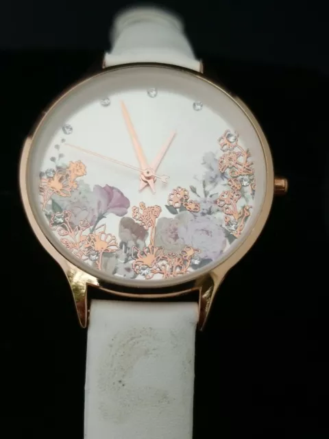 Women's Silver Floral Dial Silver Rose Gold Case Faux White Leather Band Watch