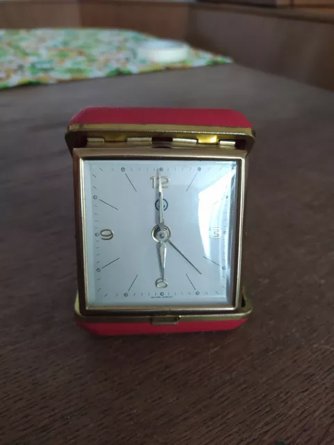 ANTICO OROLOGIO SVEGLIA MECCANICA DA VIAGGIO WESTERN GERMANY ROSSO '60s