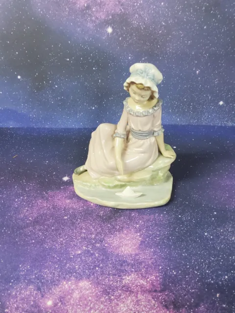 NAO by Lladro Figurine 409 Daisa 1984 - Girl with boat Sitting on waters edge