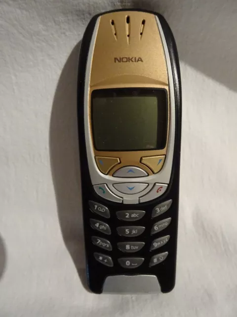 NOKIA 6310i ORIGINAL GOLD & BLACK MOBILE PHONE WITH  FIVE ORIGINAL BATTERIES.