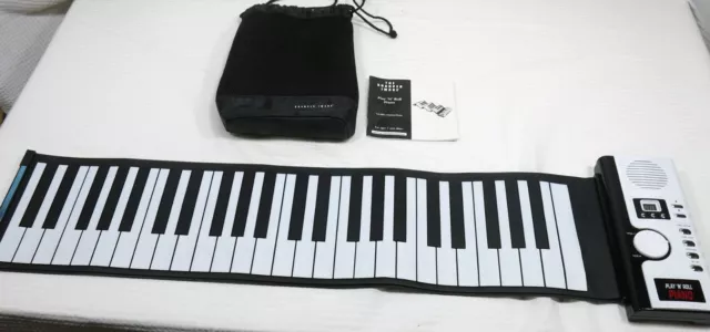 Sharper Image Play 'n' Roll Piano Keyboard w/ Case/Instruction book