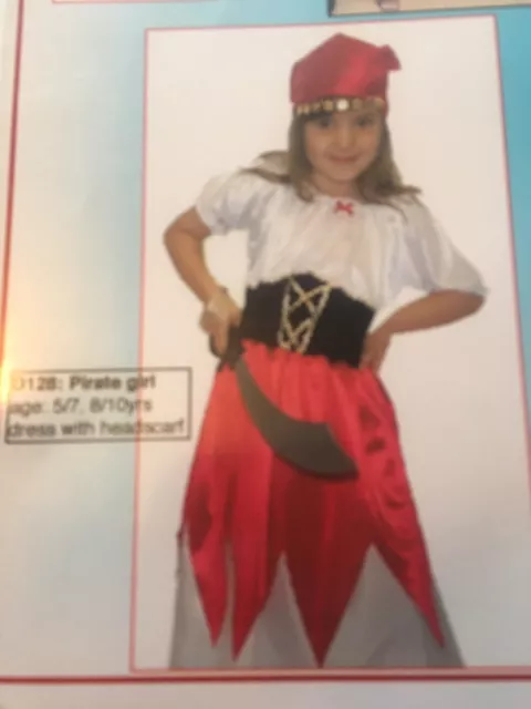 Girl’s pirate costume 5-7 Years.  Dress And Bandana With Coins