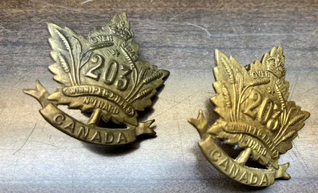 Pair of Canadian Expeditionary Force 203 Battalion Badges