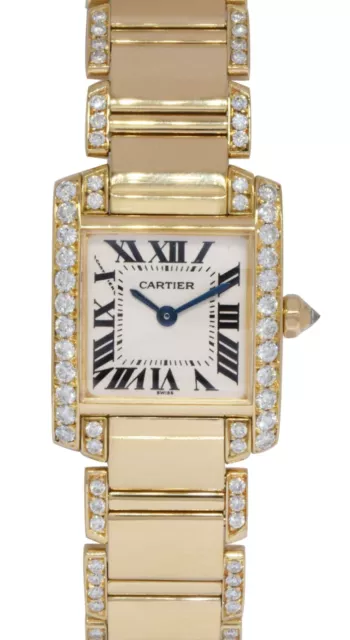Lot - CARTIER TANK LOUIS 18KT YELLOW GOLD WOMAN'S WRISTWATCH Ref. W1529856.  Serial number 52841UX. Quartz movement. Silver-grained dial wi..