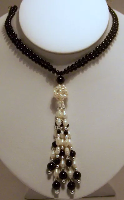 Brand New hand strung 4 strands of 4 1/2mm Onyx bead necklace, 31 inches long.