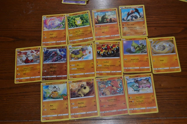 14 orange Pokémon playing/collecting cards