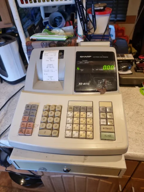 Sharp XE-A113 Electronic Cash Register Read Description