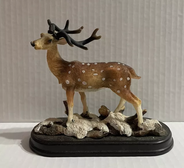 https://www.picclickimg.com/xXEAAOSwUF9ljjxp/Deer-Figurine-On-Plastic-Base-Fake-Rocks-And.webp