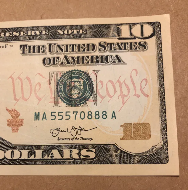 A $10 Uncirculated US Ten dollar fancy serial numbers MA 55570888 A