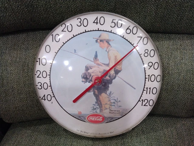 Vintage Coca-Cola Fishing Boy 12" Round Thermometer Sign with plastic cover.