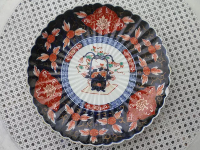 Ancienne grande assiette en porcelaine  Imari