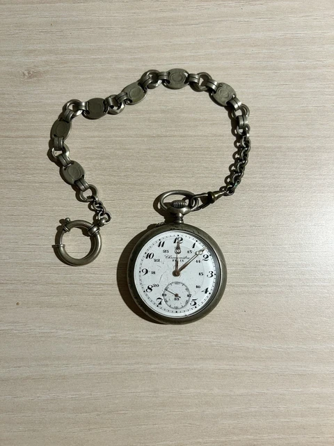 Montre Gousset Ancienne Elvia - Boîtier Doré Mécanique Manuel - Cadran émaillé Chiffres Romains