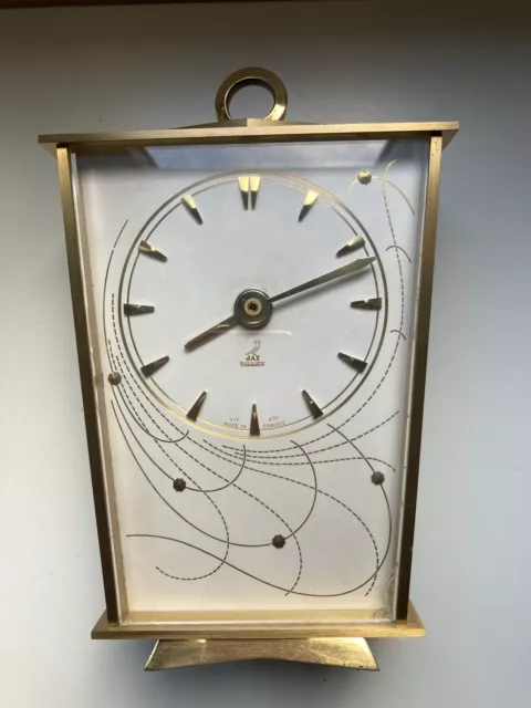 Ancienne pendule Jaz transistor années 50's vintage design clock laiton doré