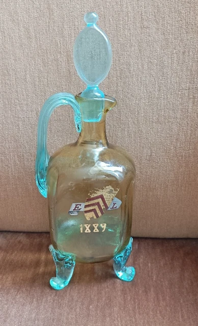 Carafe style George Sand datée 1889 blason écusson E.L. publicitaire liqueur ?