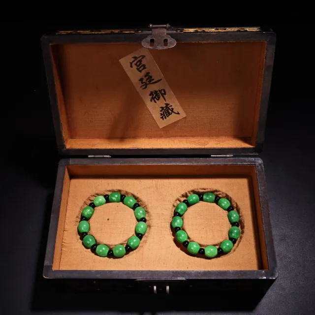 A pair of rare Qing Dynasty jade bracelets