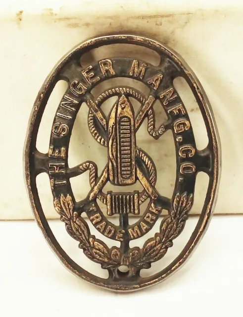 Vtg antique Singer treadle sewing machine cast iron base emblem logo name plate