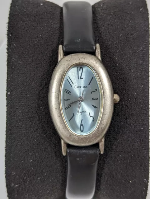 Carriage Blue Dial Oval Silver Tone Case Black Leather Band Watch