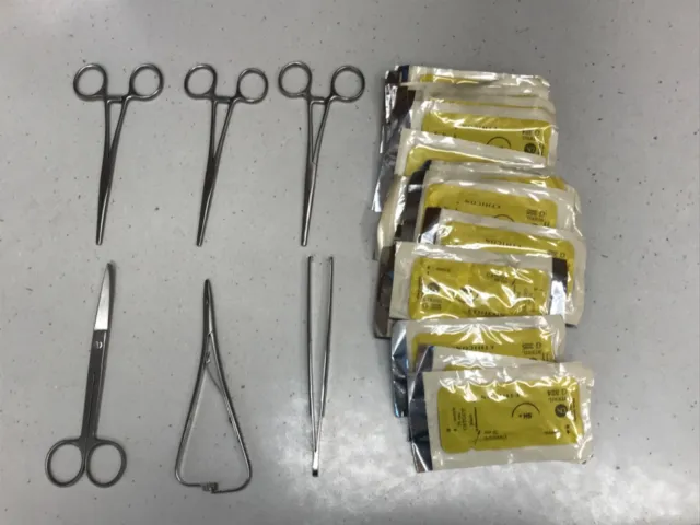 Chirurgie Instrumente mit altem Nahtmaterial rostfrei 