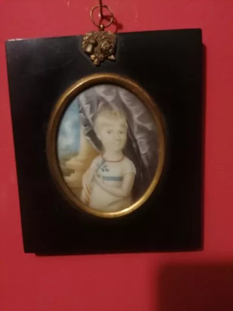 EARLY 19TH CENTURY FOLK ART PRIMITIVEPORTRAIT MINIATURE OF YOUNG GIRL circa 1820