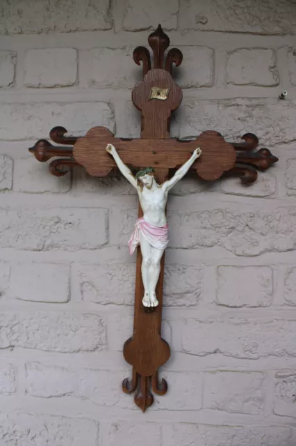 Antique French wood carved crucifix fleur de lys bisque porcelain corpus
