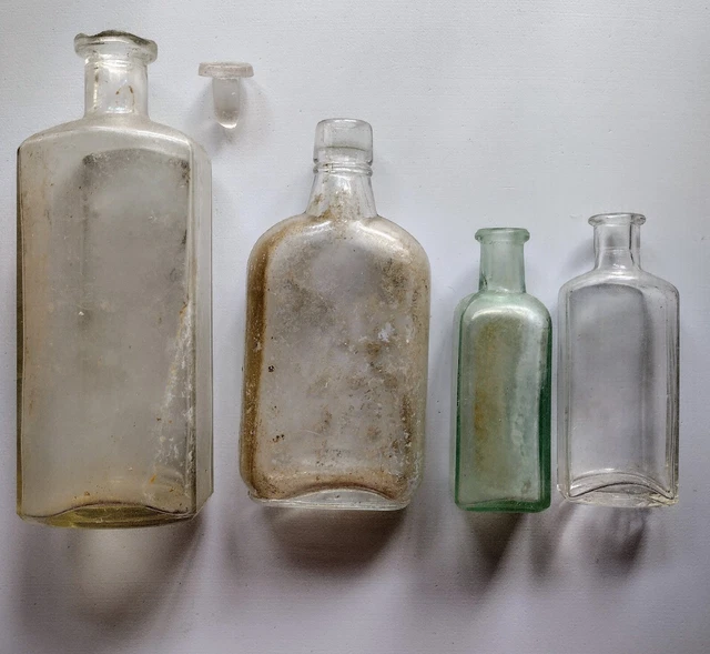 Lot of 4 Antique Clear Glass Bottles