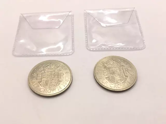 Two Uncirculated 1967 Half Crown Coins In Plastic Wallets.