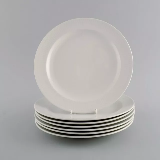 Seven Rörstrand porcelain plates. Swedish Grace. Mid 20th century.