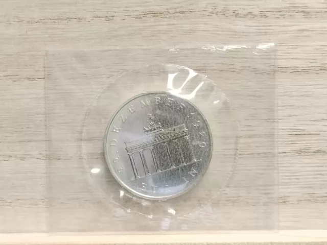 1990 20 Mark "Brandenburg Gate" Germany Silver Coin still sealed in pliofilm