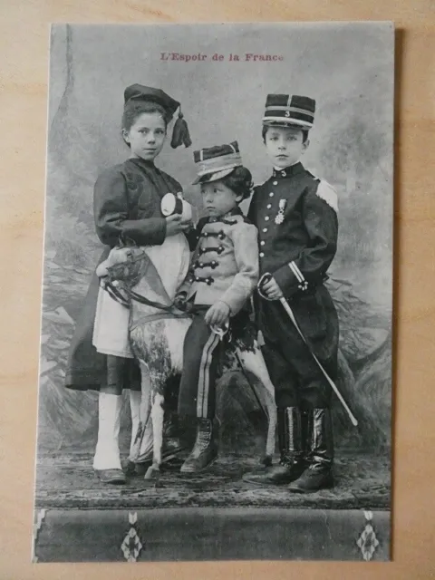 Cpa (Militaria) The Hope Of France. 3 Young Children In Soldier Outfits