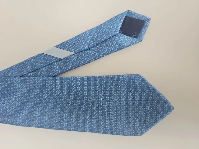 Salvatore Ferragamo Tie With The GANCINI Logo In  BLUE Color.