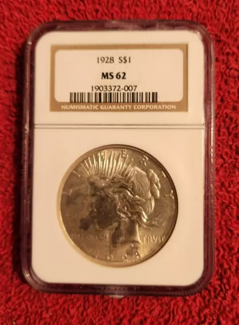 1928 p silver peace dollar NGC MS 62