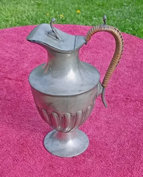 Once silver plated water jug or ewer 10 inches tall