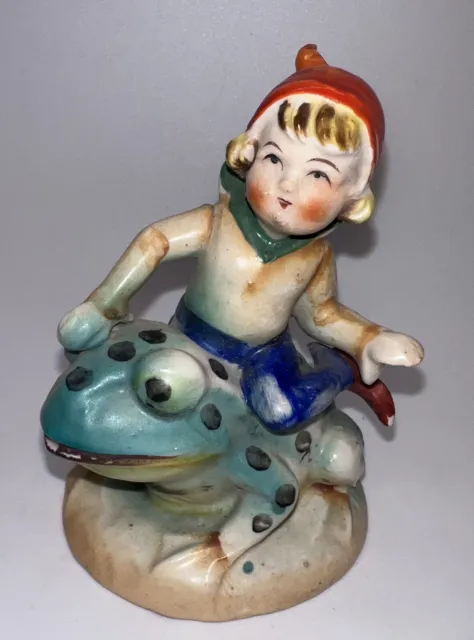 Occupied Japan Blond Pixie/Fairy/Imp/Elf Riding A Frog Figurine