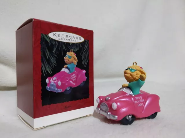 NIB 1994 Hallmark Keepsake Ornament "SIMPLY INCREDIBLE SISTER" Dog w/Pink car